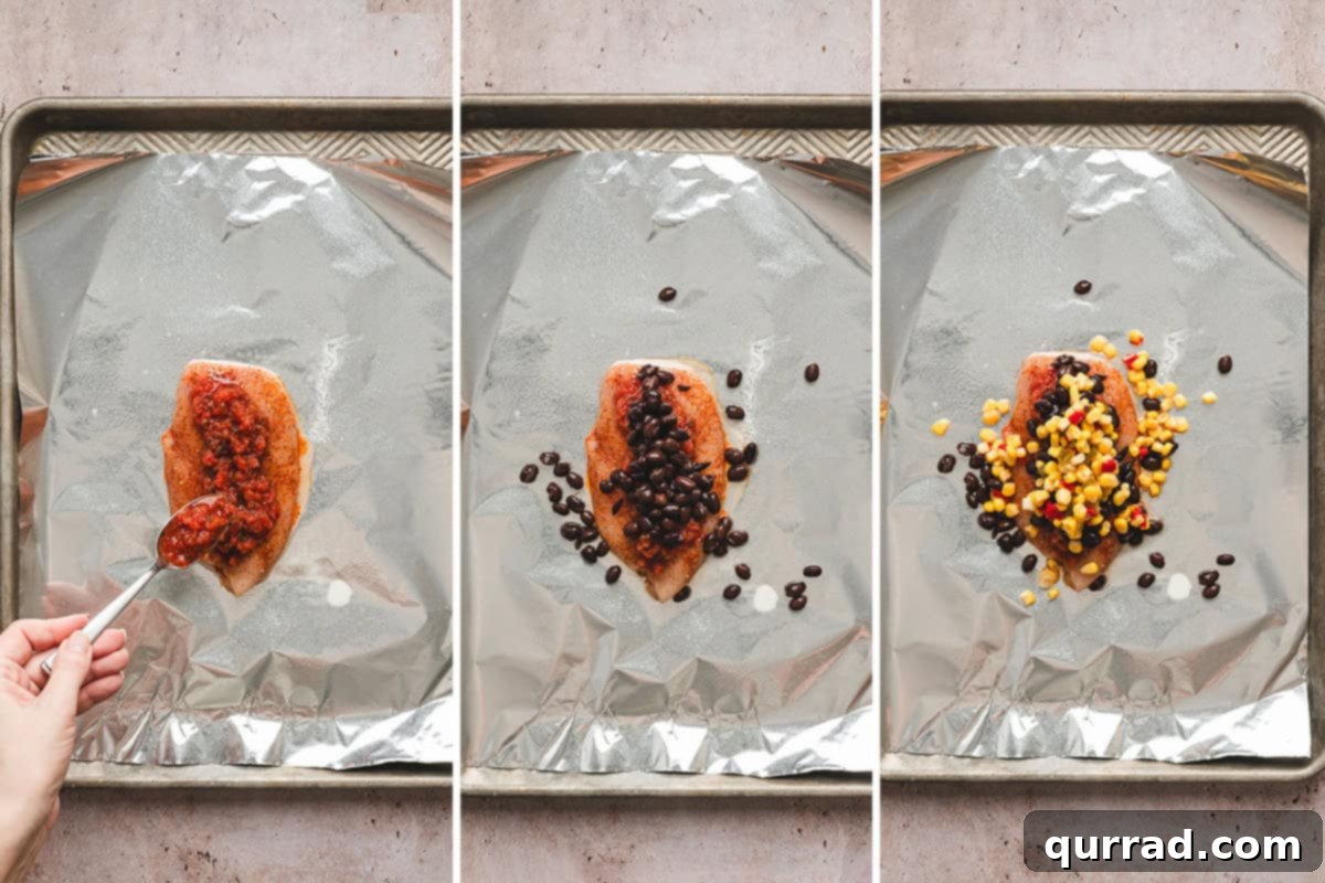 A salsa-topped chicken breast, complemented with black beans and Mexican corn.