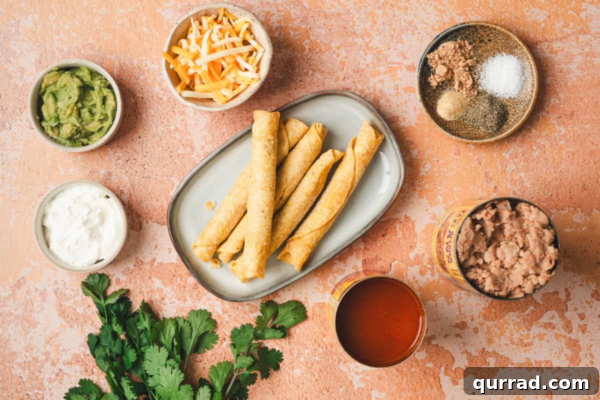 Effortless Enchilada Bake 4 The organized ingredients laid out for making lazy enchiladas, including frozen taquitos, refried beans, enchilada sauce, and cheese.