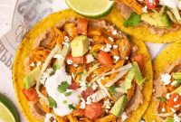 Spicy Chicken Tinga Tostadas with Fresh Salsa and Crema
