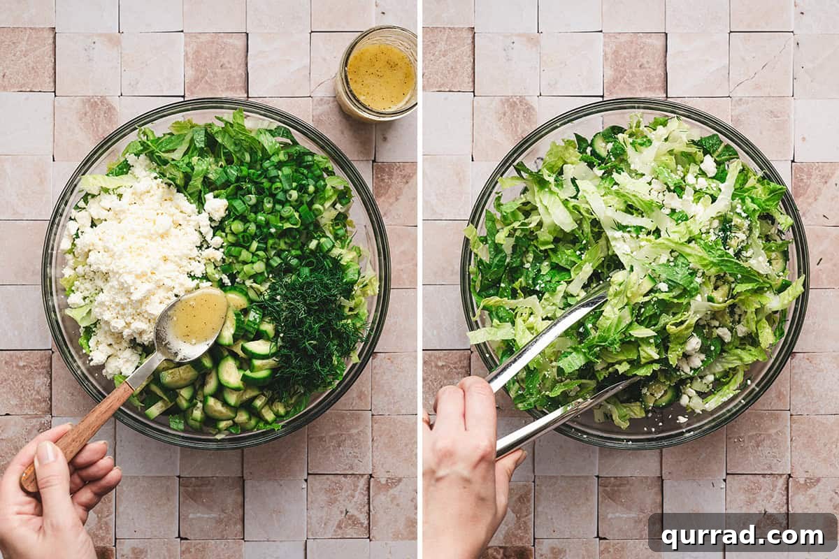 A spoon drizzling dressing over a bowl of maroulosalata, followed by a hand using tongs to mix the salad.