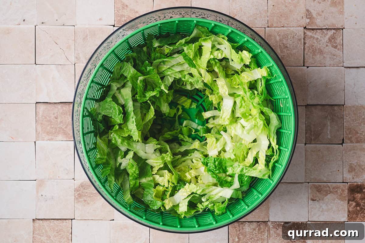 Shredded lettuce in a salad spinner.