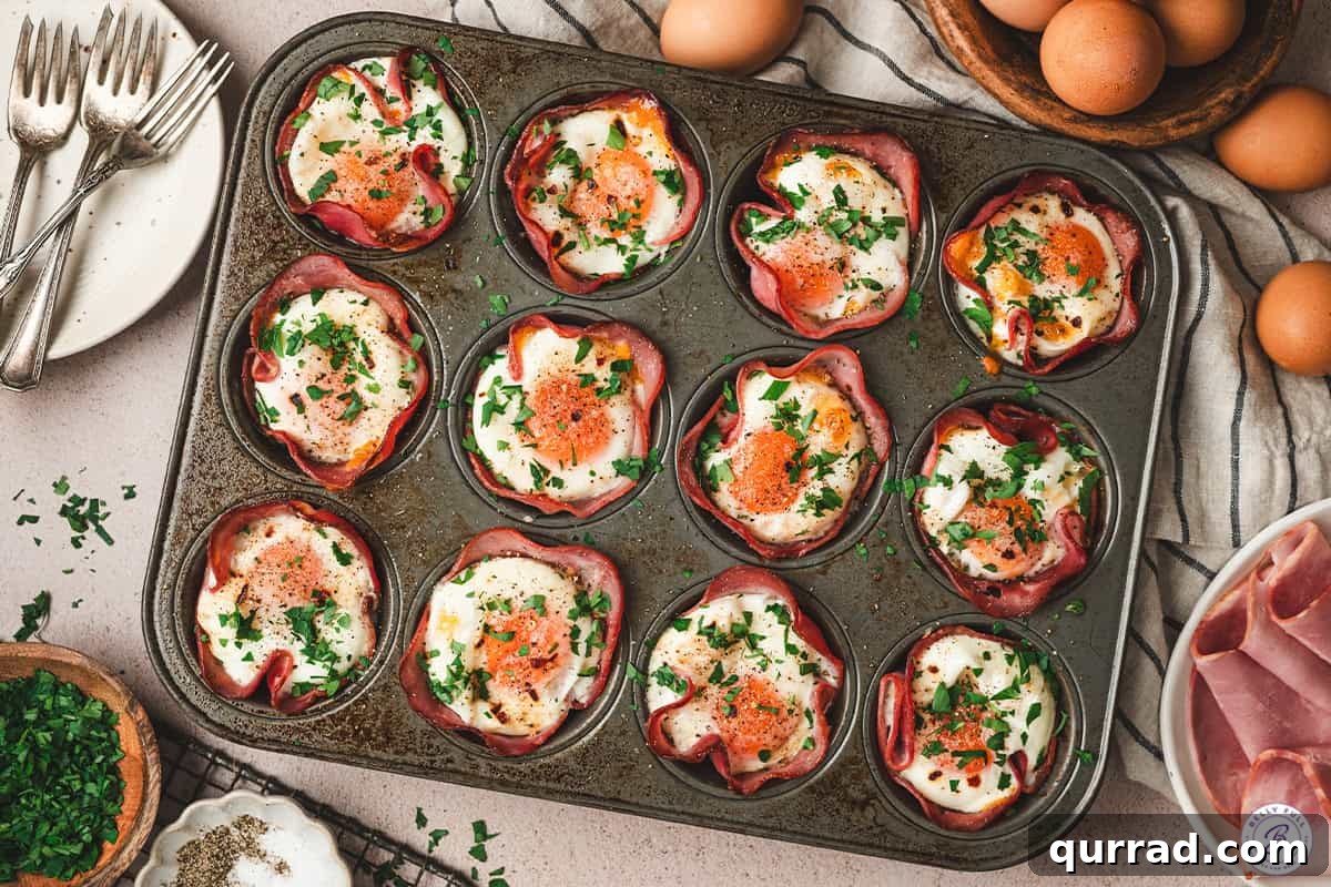 Savory Ham & Cheese Egg Cups for Quick Breakfast or Brunch 9 Overhead view of a pan of homemade ham and cheese egg cups.