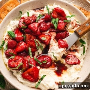 A bowl of whipped feta with balsamic strawberries