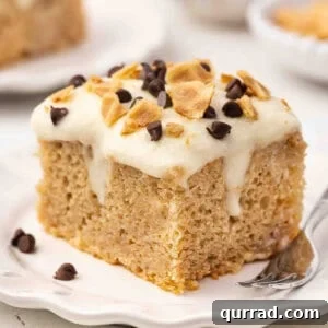 Decadent Cannoli Cake Recipe with Ricotta Filling and Crisp Shells 2 A slice of cannoli cake on a plate