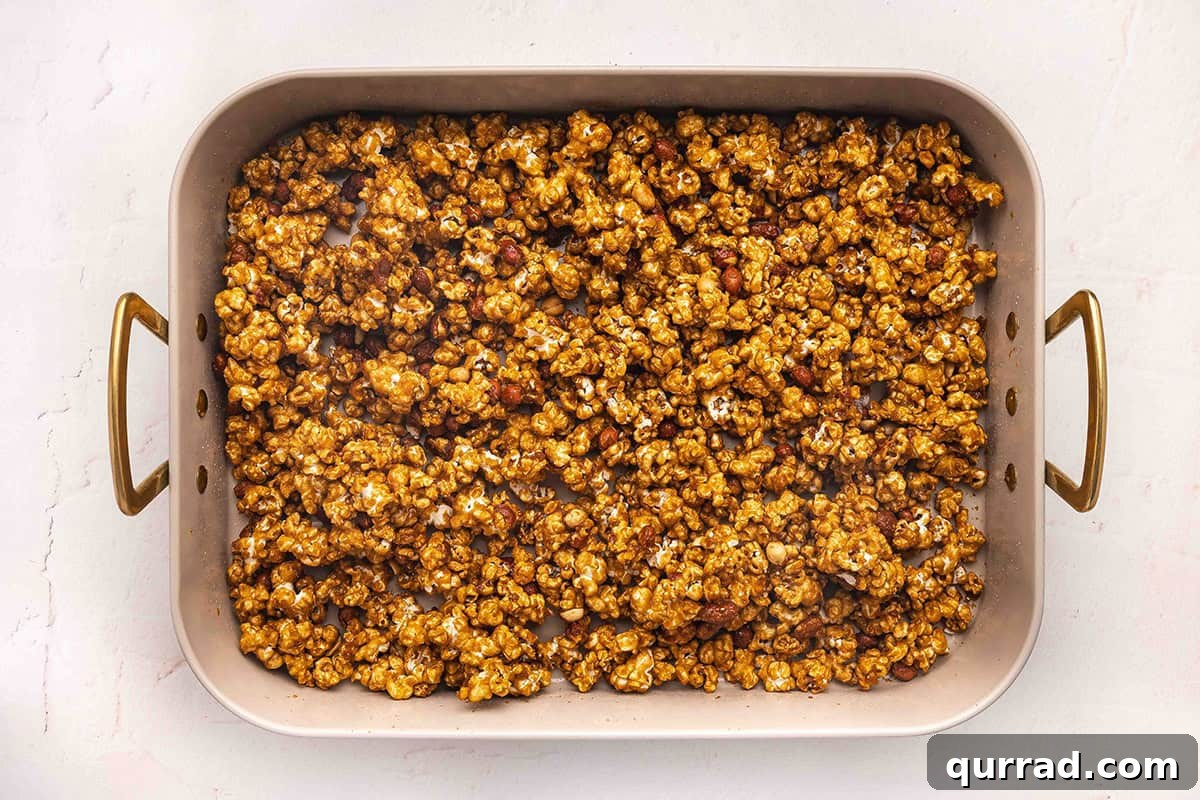 A baking sheet of homemade Cracker Jack.