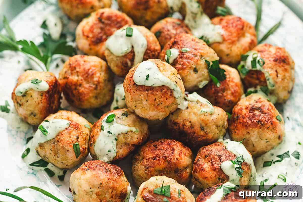 Green goddess meatballs on a plate.