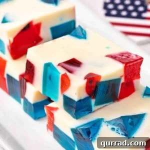 Patriotic Red, White and Blue Jello Recipe 3 Side view of slices of red white and blue jello.