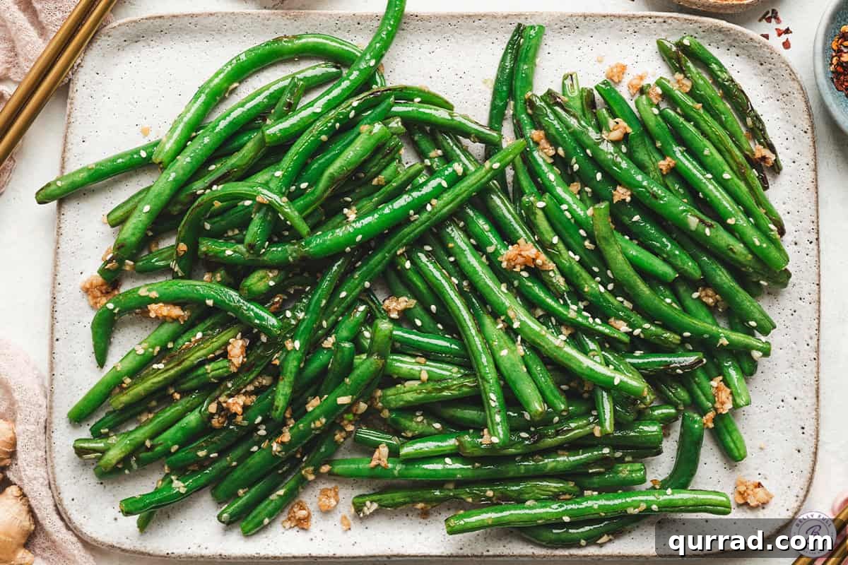 Garlic Green Beans Recipe: Sautéed with Lemon and Butter 9 Garlic green beans on a baking sheet.