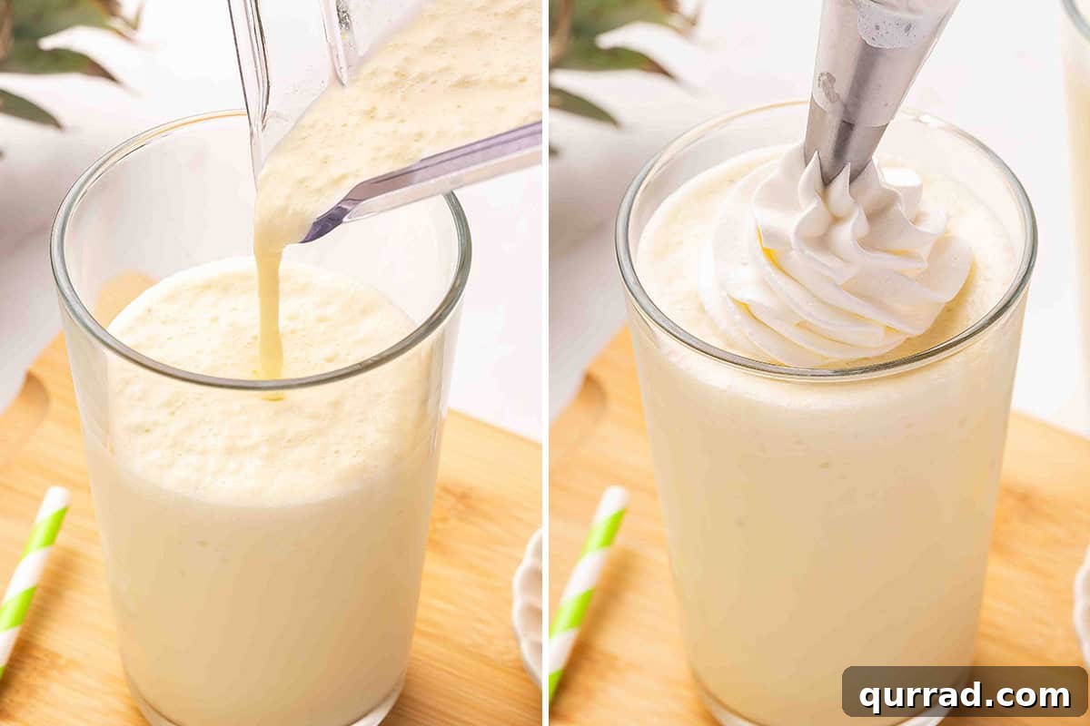 A pineapple coconut orange julius being poured into a glass, followed by whipped cream being added on top.