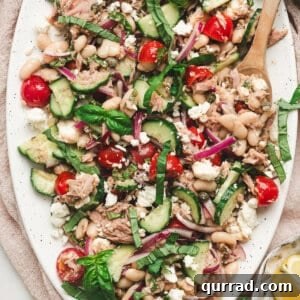 Mediterranean White Bean and Tuna Salad with Lemon Vinaigrette 3 Overhead view of white bean tuna salad on a platter.
