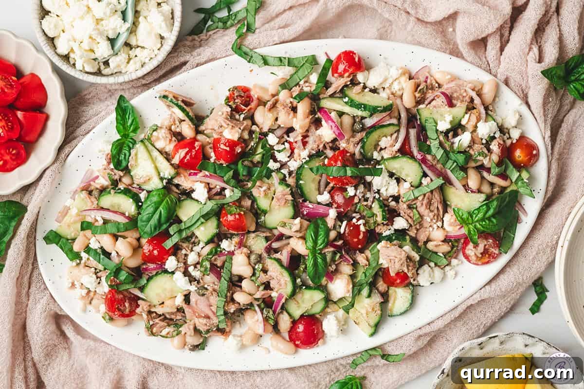 Mediterranean White Bean and Tuna Salad with Lemon Vinaigrette 7 Tuna and white bean salad on a platter.