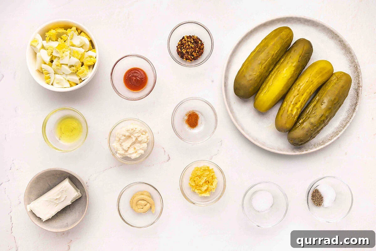 Deviled Pickles Recipe: Tangy Spicy Pickle Bites 4 The ingredients to make deviled pickles.