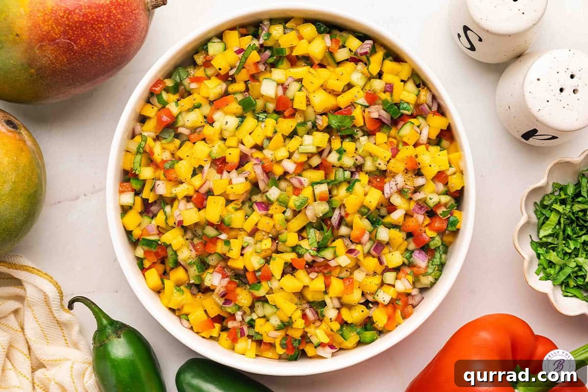 Fresh Mango Salsa Recipe with Cilantro and Lime 6 Overhead view of a bowl of mango salsa.