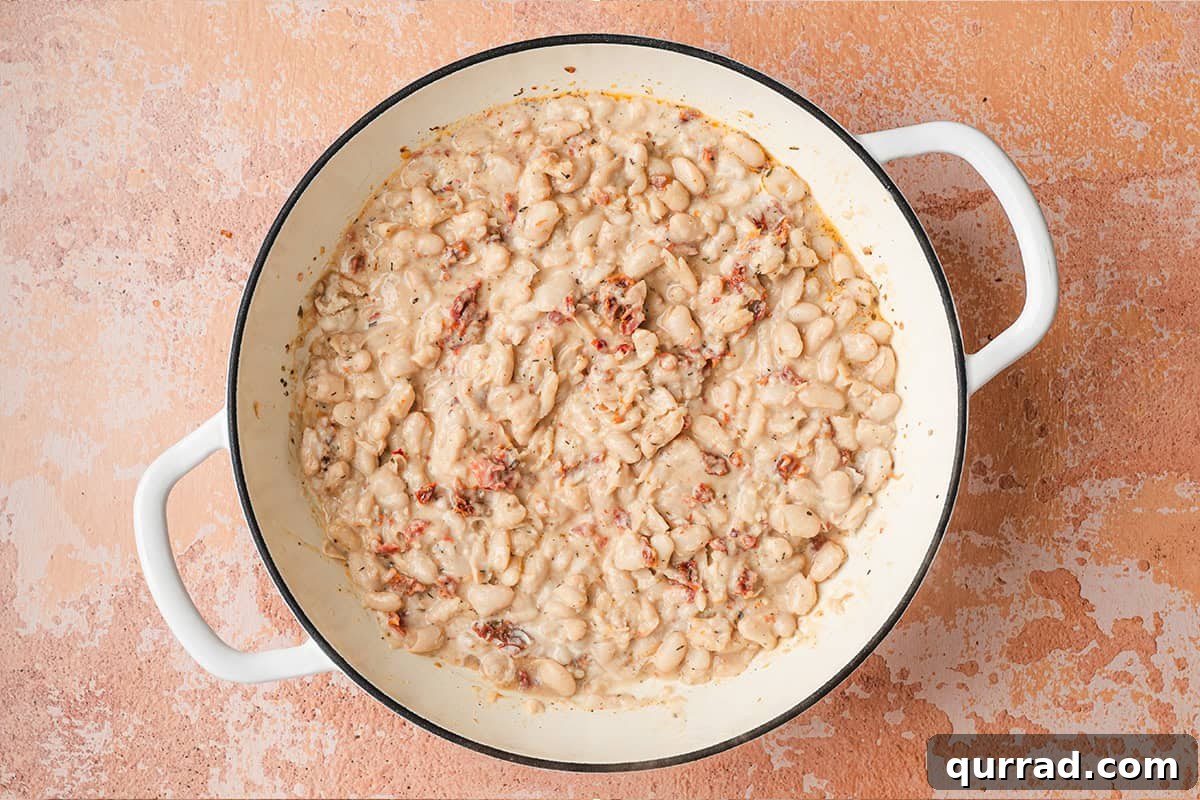 Marry Me Beans: Creamy Tomato and Herb Skillet 9 A finished skillet of Marry me white beans.