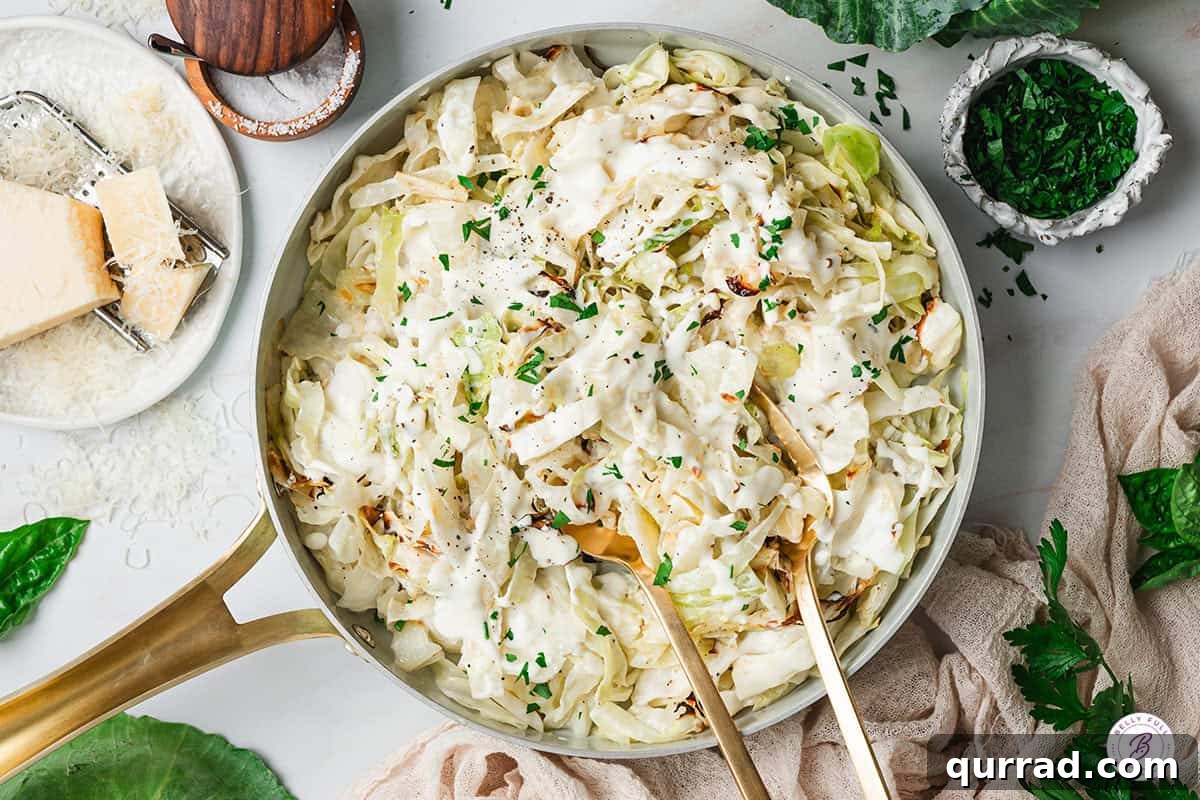 Creamy Alfredo Cabbage Ribbons 9 Overhead view of alfredo cabbage ribbons in a skillet.