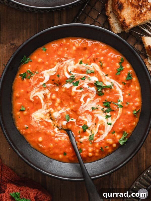 Marry Me Butter Swirl Biscuits 10 overhead bowl of tomato soup with drizzle of cream
