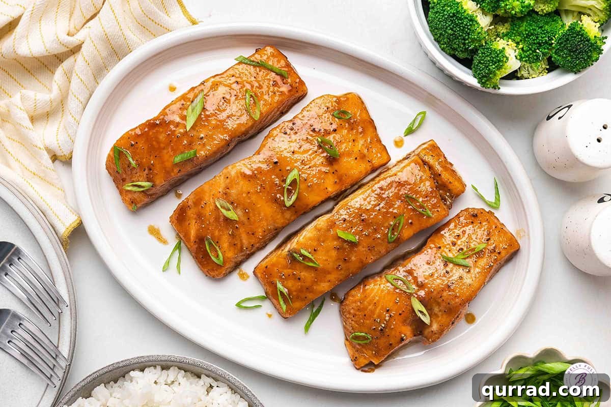 Sticky Brown Sugar-Glazed Salmon Recipe 8 Overhead view of brown sugar glazed salmon on a platter.